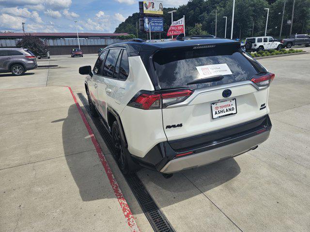 Photo of 2022 Blizzard Pearl/Midnight Black Metallic Toyota RAV4 Hybrid