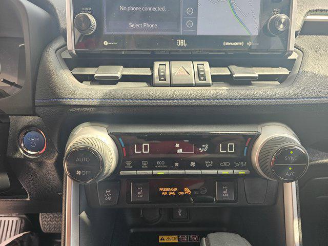 Photo of 2022 Blizzard Pearl/Midnight Black Metallic Toyota RAV4 Hybrid