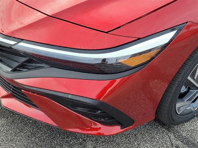 Photo of 2025 Red Metallic Hyundai ELANTRA HEV