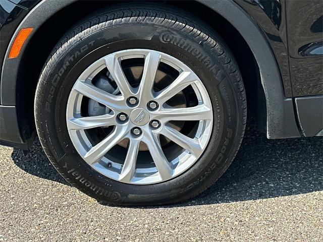 Photo of 2023 Stellar Black Metallic Cadillac XT4