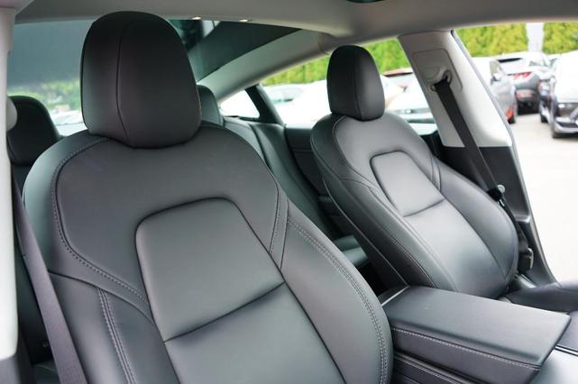 Photo of 2021 Deep Blue Metallic Tesla Model 3
