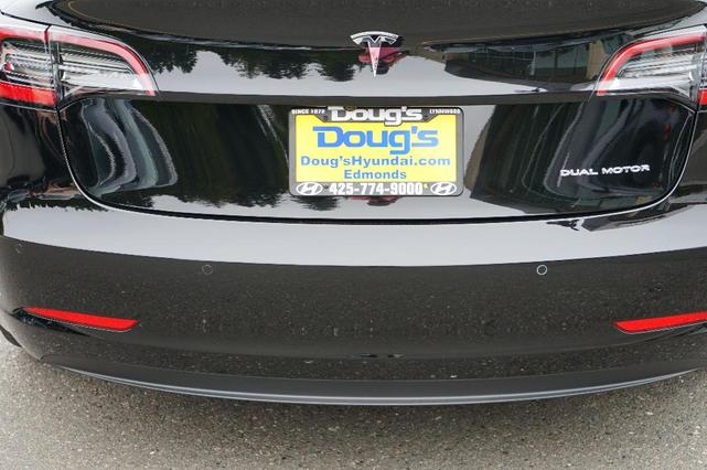 Photo of 2021 Deep Blue Metallic Tesla Model 3