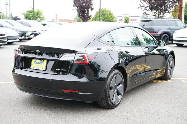 Photo of 2021 Deep Blue Metallic Tesla Model 3