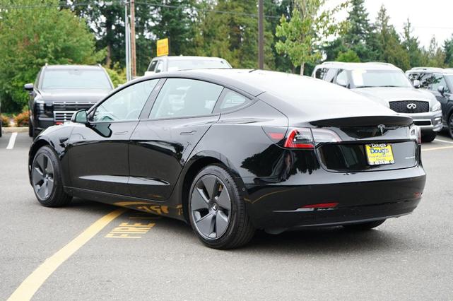 Photo of 2021 Deep Blue Metallic Tesla Model 3