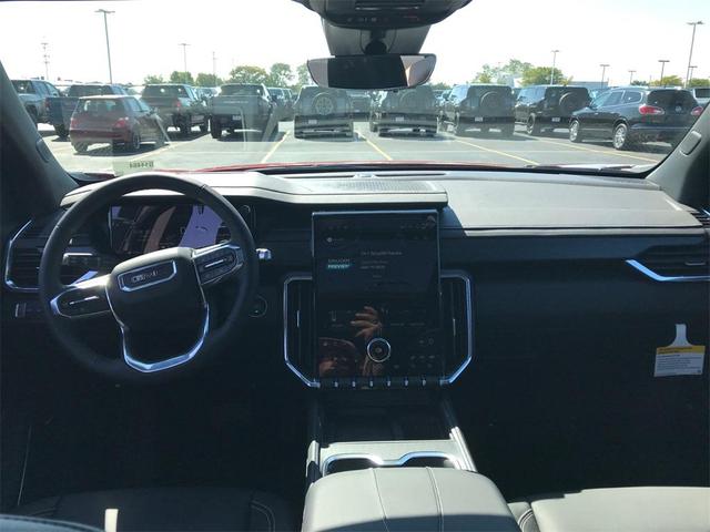 Photo of 2026 Volcanic Red Tintcoat GMC Acadia