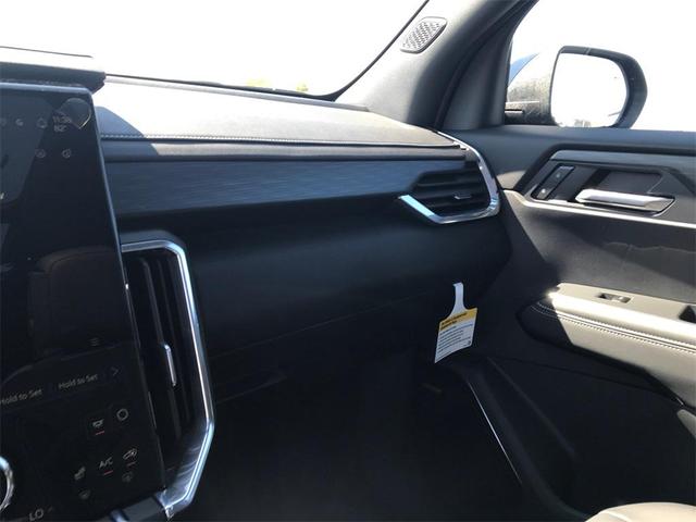 Photo of 2026 Volcanic Red Tintcoat GMC Acadia