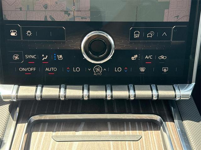Photo of 2025 Deep Ocean Metallic GMC Sierra EV