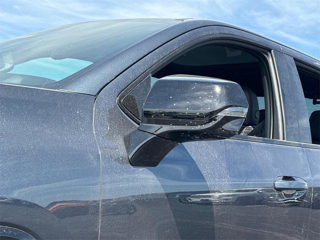 Photo of 2025 Deep Ocean Metallic GMC Sierra EV