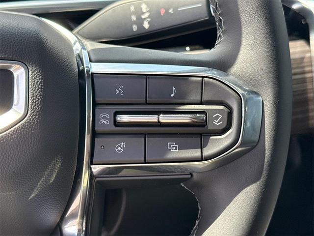Photo of 2025 Deep Ocean Metallic GMC Sierra EV