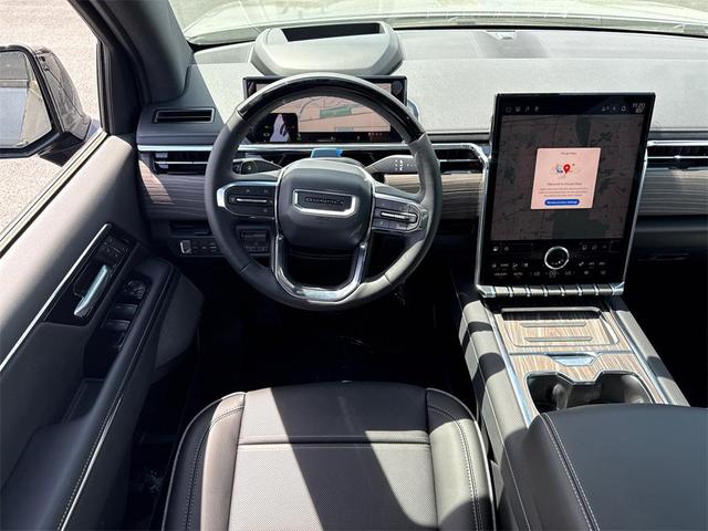 Photo of 2025 Deep Ocean Metallic GMC Sierra EV