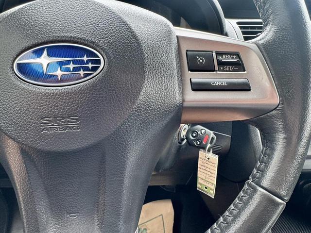 Photo of 2014 Venetian Red Pearl Subaru Impreza