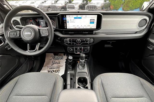 Photo of 2025 Granite Crystal Metallic Clearcoat Jeep Wrangler