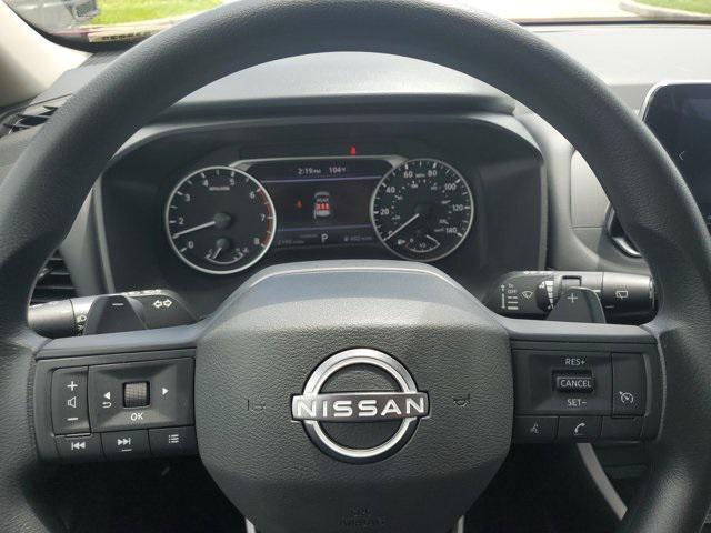 Photo of 2025 Scarlet Ember Tintcoat Nissan Rogue