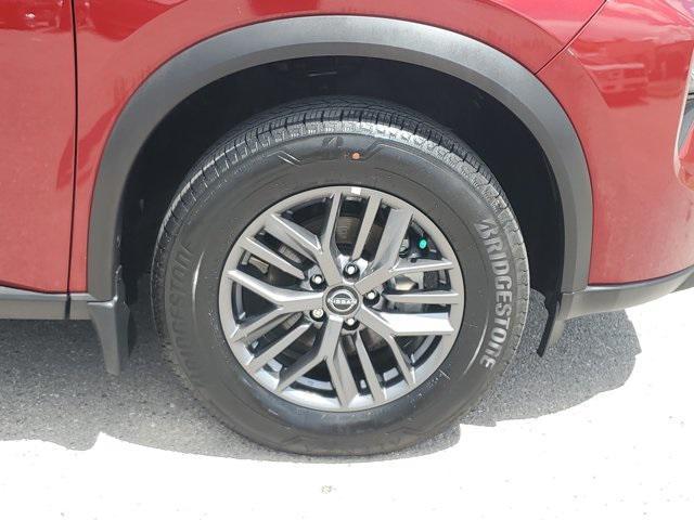 Photo of 2025 Scarlet Ember Tintcoat Nissan Rogue