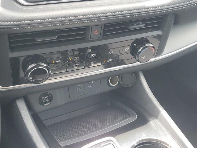 Photo of 2025 Scarlet Ember Tintcoat Nissan Rogue
