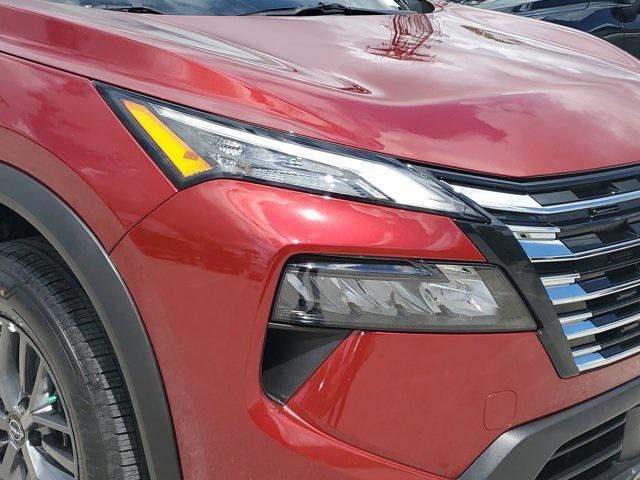 Photo of 2025 Scarlet Ember Tintcoat Nissan Rogue