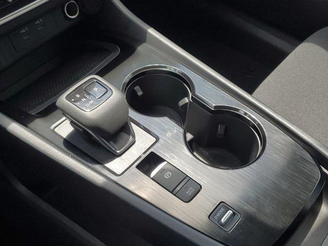 Photo of 2025 Scarlet Ember Tintcoat Nissan Rogue