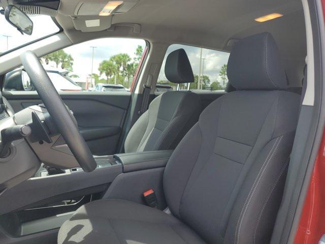 Photo of 2025 Scarlet Ember Tintcoat Nissan Rogue