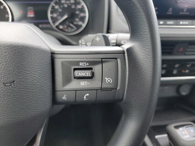 Photo of 2025 Scarlet Ember Tintcoat Nissan Rogue
