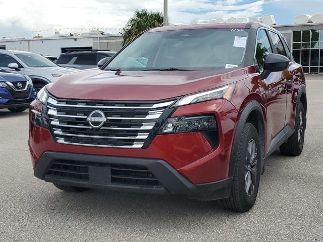 Photo of 2025 Scarlet Ember Tintcoat Nissan Rogue