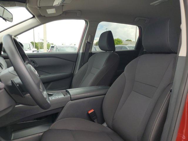 Photo of 2025 Scarlet Ember Tintcoat Nissan Rogue