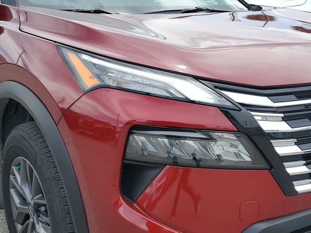 Photo of 2025 Scarlet Ember Tintcoat Nissan Rogue