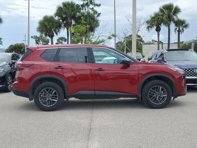 Photo of 2025 Scarlet Ember Tintcoat Nissan Rogue