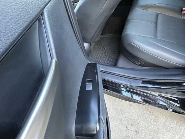 Photo of 2025 Midnight Black Metallic Toyota Camry