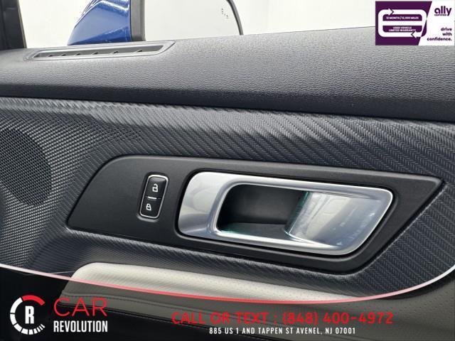 Photo of 2024 Blue Ford Mustang
