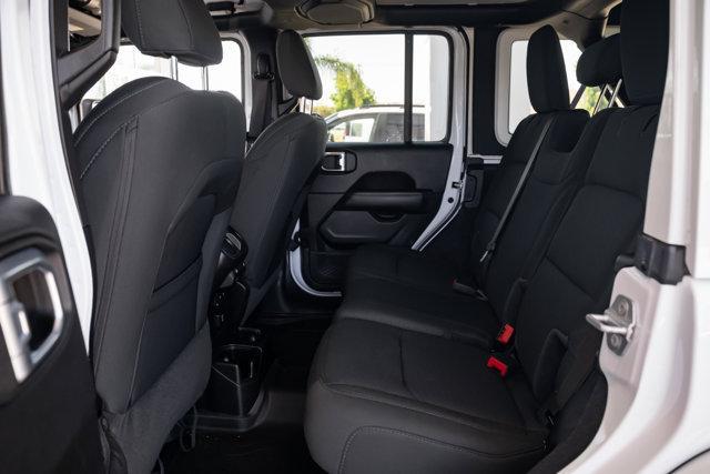 Photo of 2021 Bright White Clearcoat Jeep Wrangler Unlimited