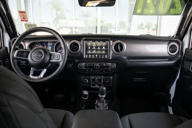 Photo of 2021 Bright White Clearcoat Jeep Wrangler Unlimited