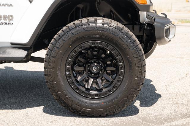 Photo of 2021 Bright White Clearcoat Jeep Wrangler Unlimited