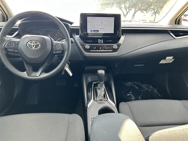 Photo of 2025 Midnight Black Metallic Toyota Corolla Hybrid