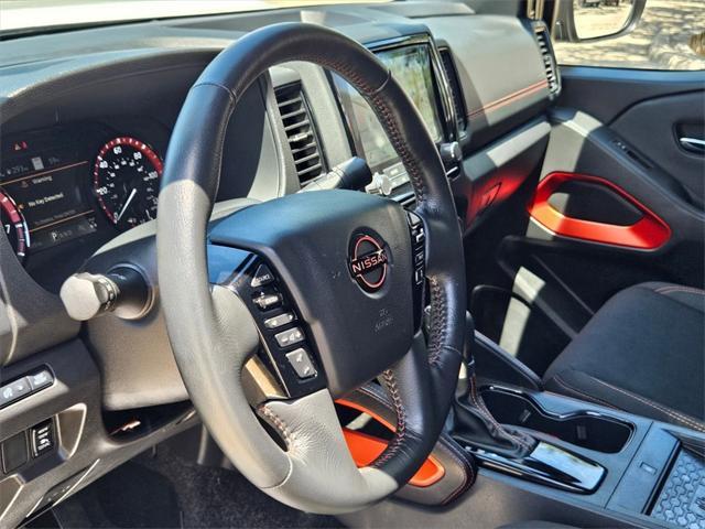 Photo of 2024 Glacier White Nissan Frontier