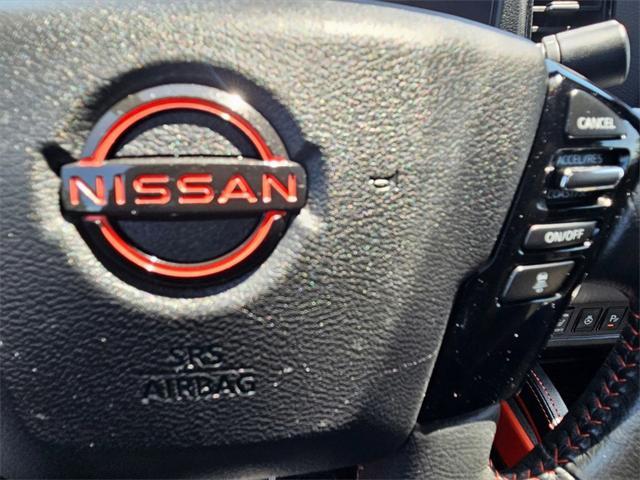 Photo of 2024 Glacier White Nissan Frontier