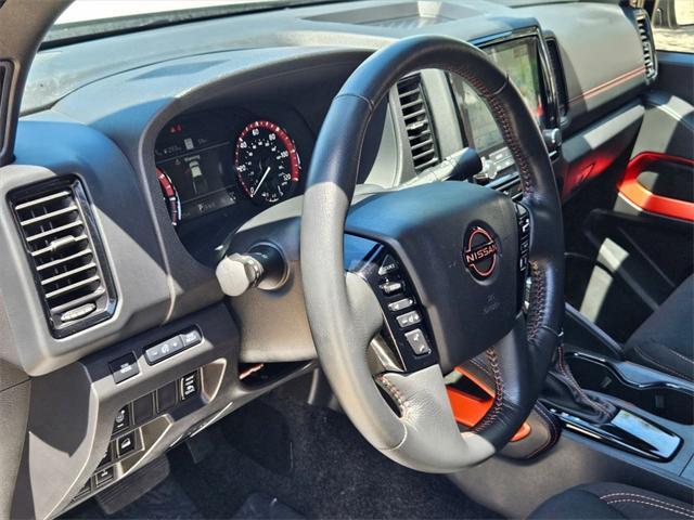 Photo of 2024 Glacier White Nissan Frontier
