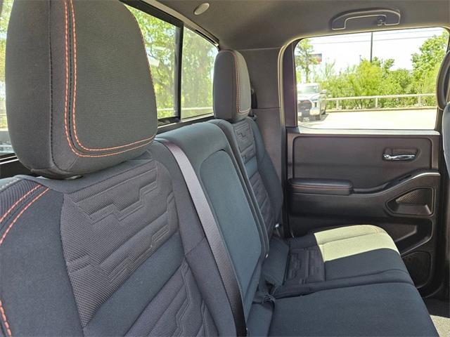Photo of 2024 Glacier White Nissan Frontier