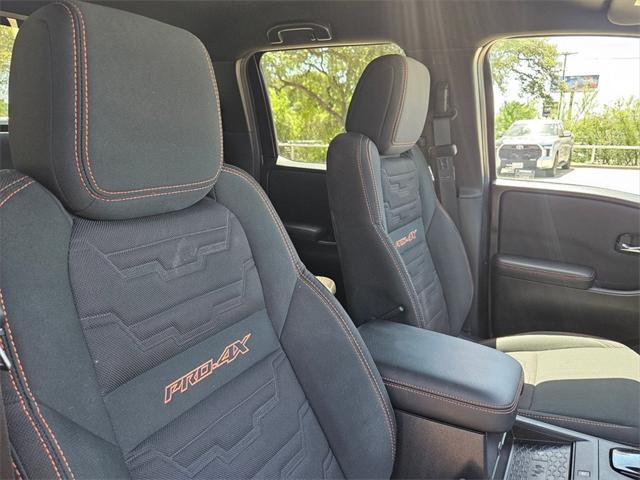 Photo of 2024 Glacier White Nissan Frontier