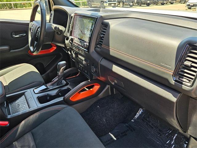 Photo of 2024 Glacier White Nissan Frontier
