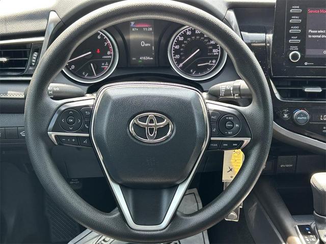 Photo of 2023 Midnight Black Metallic Toyota Camry