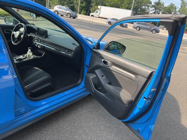 Photo of 2022 Boost Blue Pearl Honda Civic