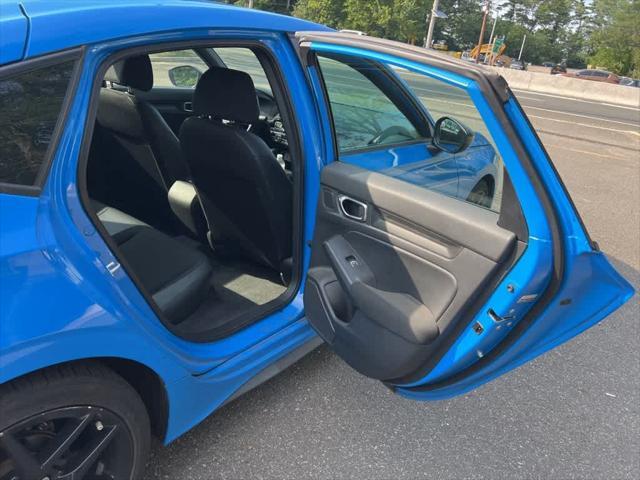 Photo of 2022 Boost Blue Pearl Honda Civic