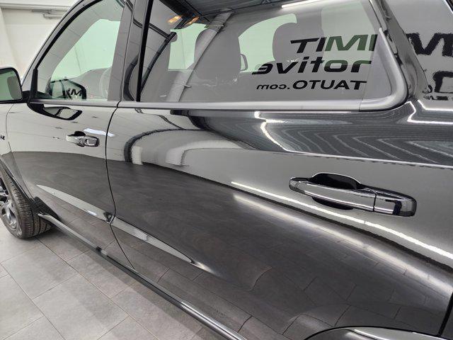 Photo of 2024 DB Black Clearcoat Dodge Durango