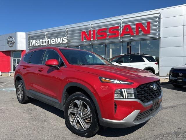 Photo of 2023 Calypso Red Hyundai SANTA FE