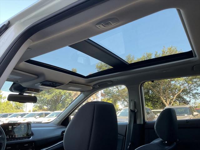 Photo of 2023 Pearl White Tricoat Nissan Rogue