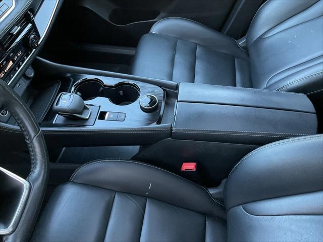 Photo of 2023 Pearl White Tricoat Nissan Rogue