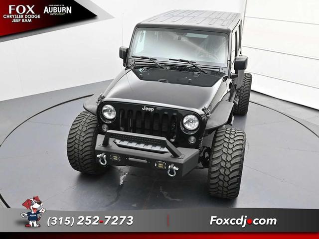 Photo of 2016 Black Clearcoat Jeep Wrangler Unlimited
