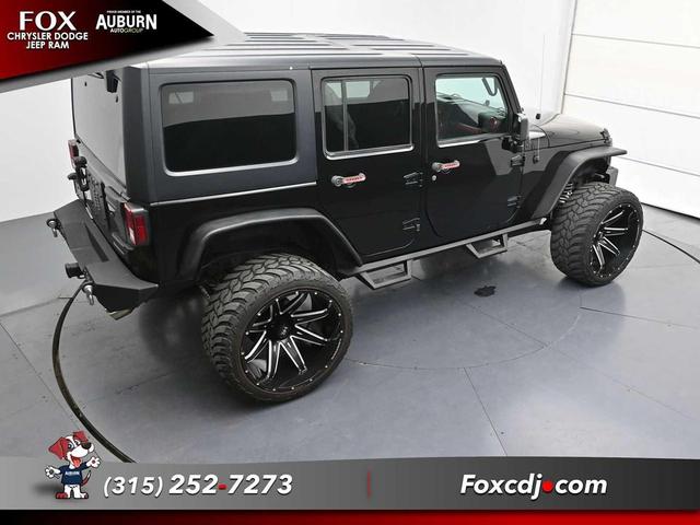 Photo of 2016 Black Clearcoat Jeep Wrangler Unlimited