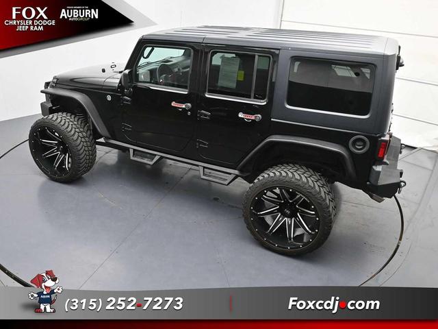 Photo of 2016 Black Clearcoat Jeep Wrangler Unlimited