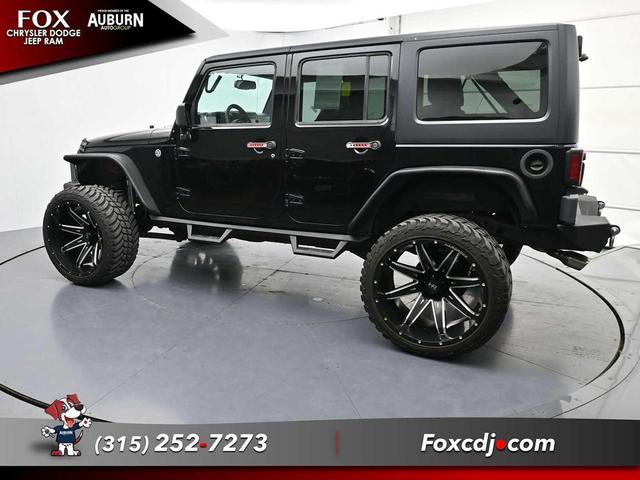 Photo of 2016 Black Clearcoat Jeep Wrangler Unlimited